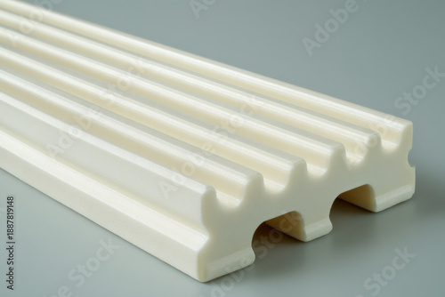 Minimal silicone material close-up with single elongated groove and soft shadowing