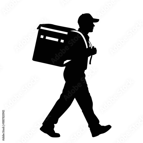 Delivery person walking with package on shoulder in urban setting  