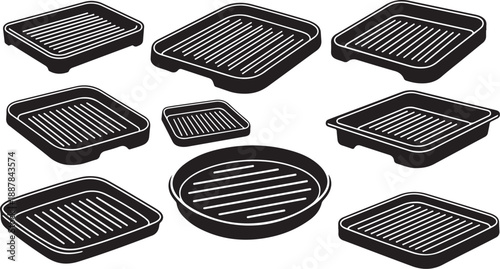 Collection of various black grill pans and griddles displayed
