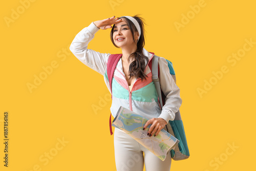 Female guide with map looki...