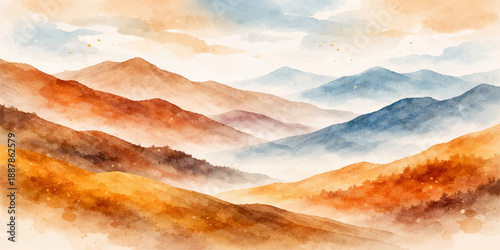 A beautiful sunset sky glows over a misty mountain landscape where sunbeams pierce through blue clouds and fog to illuminate the snowy peaks and valley at dawn