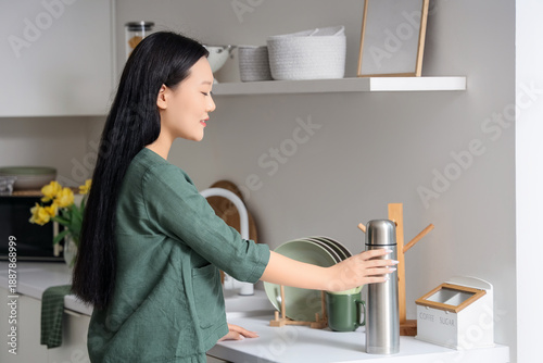 Young Asian woman with ther...