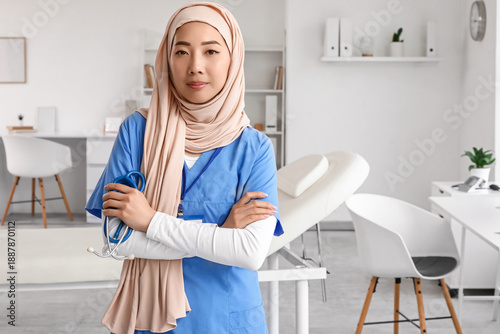 Female Muslim doctor with s...