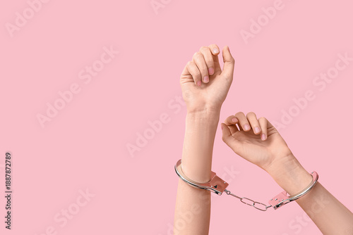 Female hands in handcuffs o...