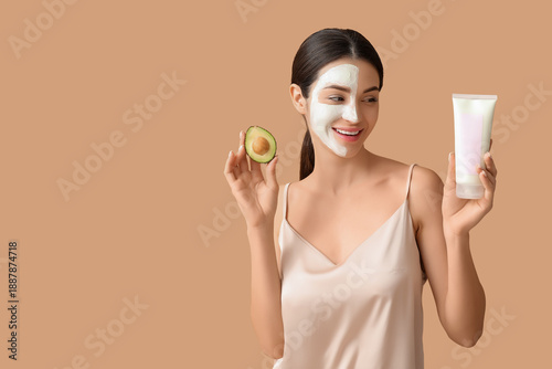 Happy young woman with tube...