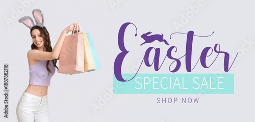 Happy young woman in bunny ...