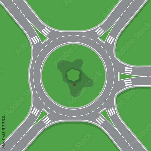 Top View of a Roundabout Intersection with Greenery and Pedestrian Crossings