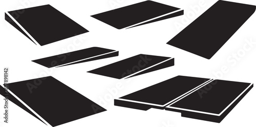 Collection of black notebooks floating in mid air isolated