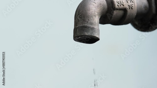 A faucet that isn't flowing water: the concept of water shortage and the water crisis.