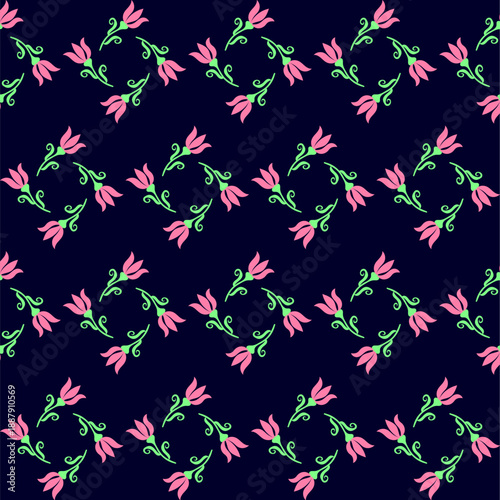 Floral pattern of small pink flowers on a black background