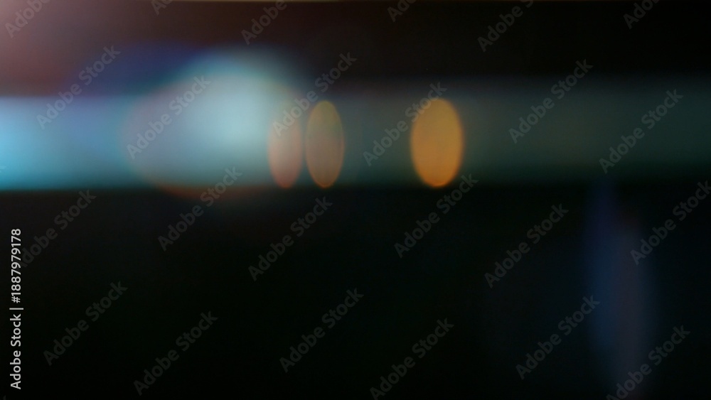 Fototapeta premium Real Lens Flare Reflections for Overlay or Transition Isolated on Black Background
