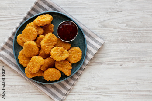 Chicken Nuggets with Sweet Chili Sauce on a Plate, top view. Copy space.