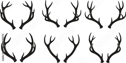 Collection of black antlers on white background