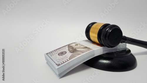 Tableau sur toile Judicial Gavel on Stack of Dollar Banknotes for Corruption and Legal Cost Concep