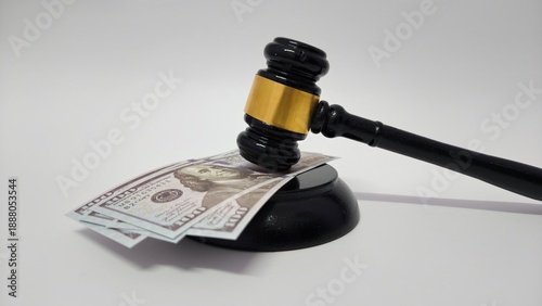 Judicial Gavel on Stack of Dollar Banknotes for Corruption and Legal Cost Concept