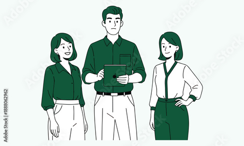 Business colleagues in business casual attire standing together with a tablet