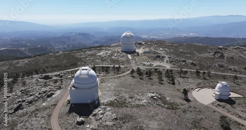 Calar Alto Observatory Spain aerial wide view of telescope domes and scientific complex on mountain plateau with remote highland landscape