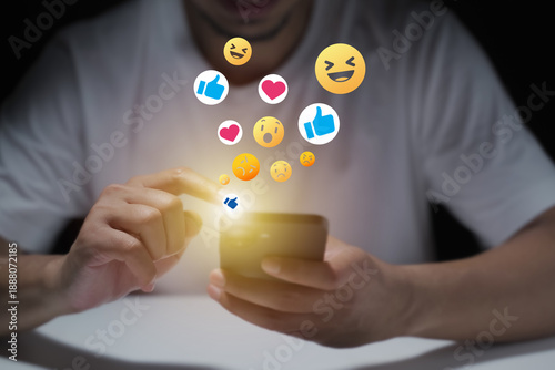 A man's hand is using a laptop or smartphone to chat on social media; communication concept, social networking, contact, online.