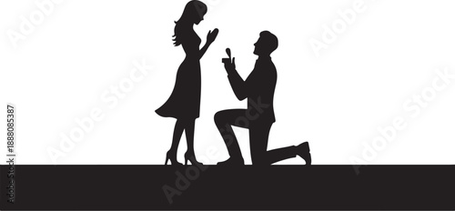 Silhouette of man proposing to woman with ring proposal