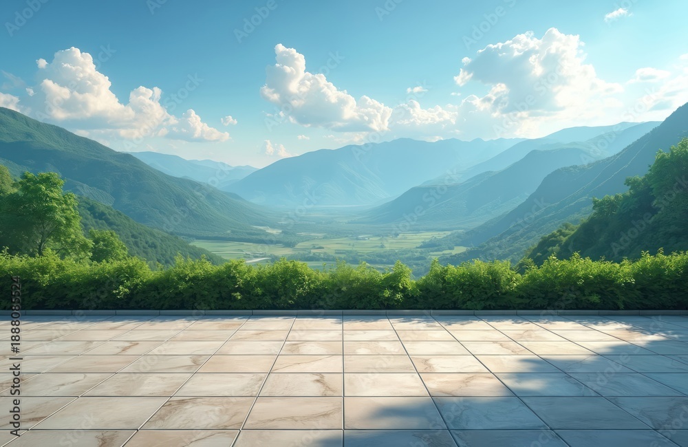 Obraz premium Scenic valley landscape with verdant rolling hills under a bright blue sky with fluffy white clouds. A paved terrace in foreground overlooks lush green nature. Perfect outdoor setting.