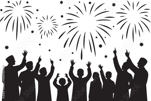 Silhouettes of people watching fireworks display at night