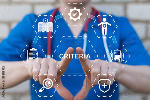 Doctor using virtual touch screen presses the word CRITERIA. Criteria Controlling Follow Guidelines Conduct Concept. Criteria evaluation. Goal setting and achievement strategy.