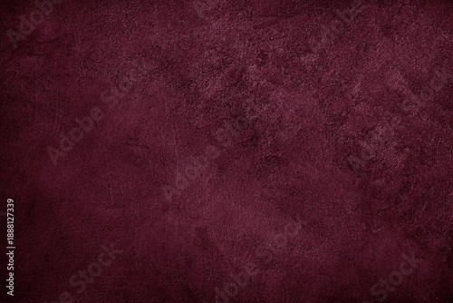 Black dark purple burgundy red wine plum texture background. Painted concrete wall surface. Grunge rough uneven plaster scratched damaged. Close-up. Empty blank template design ad.