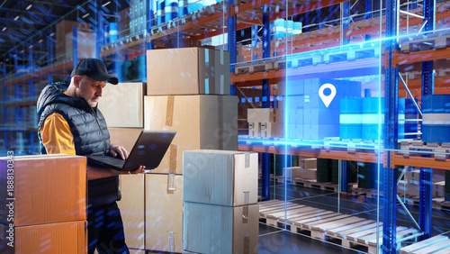 Canvastavla Warehouse logistics, inventory management and digital tracking as a warehouse worker checks shipment data on a laptop among stacked boxes and automated storage systems