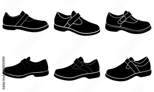 Set of six black children's shoes with velcro straps on white background six shoes