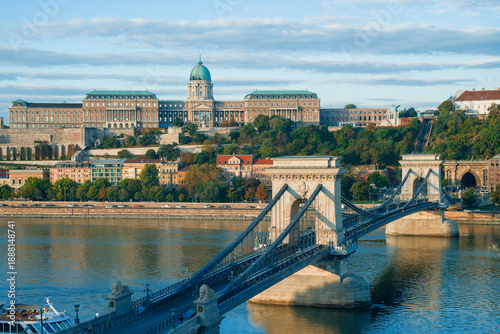 Obraz na plátne Szechenyi Chain Bridge and Buda Castle with autumn foliage at sunrise in Budapes