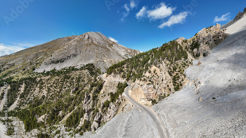 Winding mountain road crossing the French Alps at Col d'Izoard, Hautes-Alpes, France, Europe.