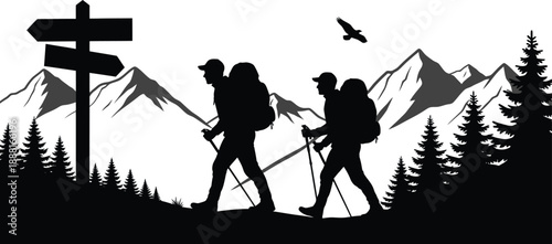 Silhouette of two hikers with backpacks walking on mountain trail with signpost and trees