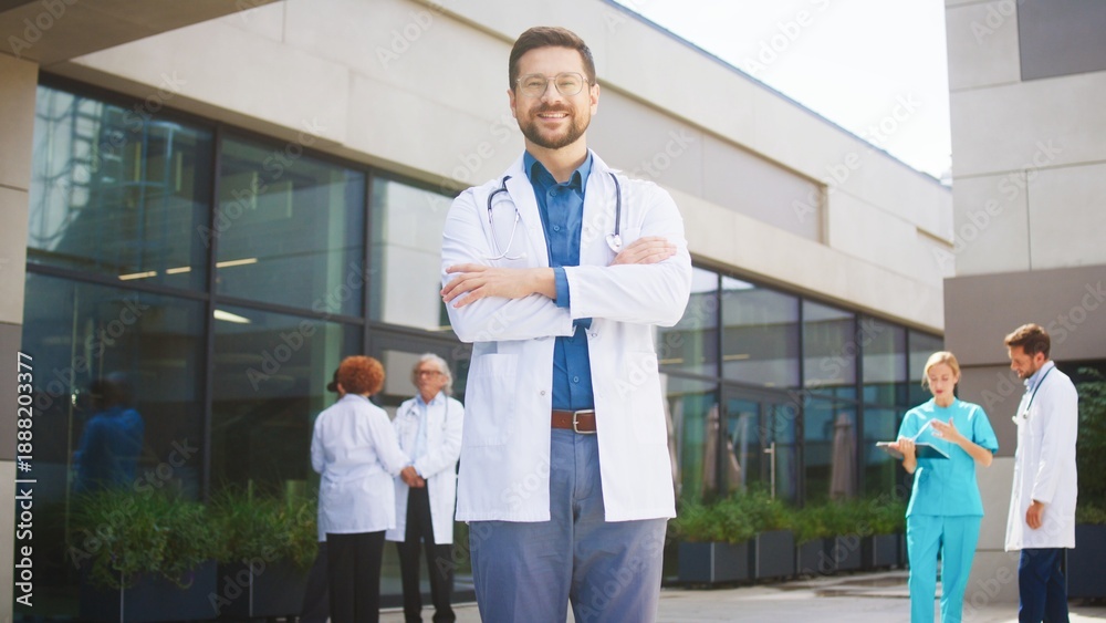 custom made wallpaper toronto digitalConfident Caucasian male doctor standing outside hospital. Specialist crossing arms while posing. Medical professional smiling calmly. Background colleagues reviewing charts near clinic.