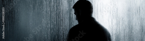 Silhouette man window rain reflection shadow loneliness sadness depression dark glass wet rainy person profile moody emotional crisis economic