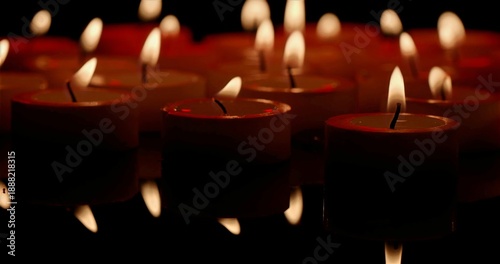 Bild auf Leinwand Candles Glow Quietly, Serene Scene Featuring Glowing Tealights And Reflective Sh
