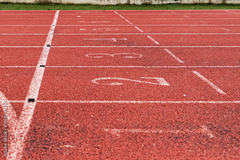 Fototapeta premium Athletics track number on the running track in the stadium