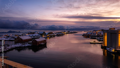 Bild auf Leinwand Svolver Norway Lofoten Islands Beautiful view of a harbor with a sunset in the background