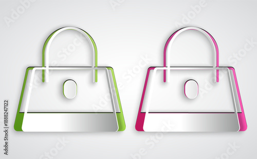 Paper cut Handbag icon isolated on grey background. Female handbag sign. Glamour casual baggage symbol. Paper art style. Vector