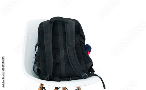 Everyday backpack for laptop and travel. Concept of getting ready for school, university, or office. Minimalist interior and travel readiness