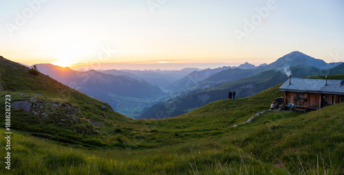 Tableau sur toile Sunset at swiss mountain hut flueseeli in alpine mountain region