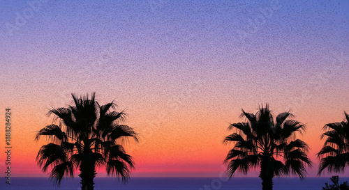 Large flock of starlings creates mesmerizing patterns as they fly against a backdrop of pink and purple sunset sky, with the silhouettes of palm trees adding a tropical touch