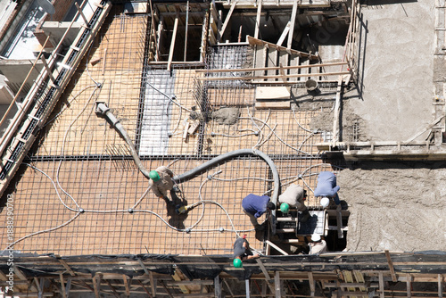 Wallpaper Mural Deployment of concrete and materials of construction. Torontodigital.ca