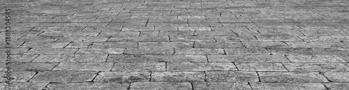 Panel kuchenny z motywem Old stone pavement background used for vintage city street textures, urban Perspective concrete block pavement. City sidewalk block or the pattern of stone block paving Empty floor in perspective view