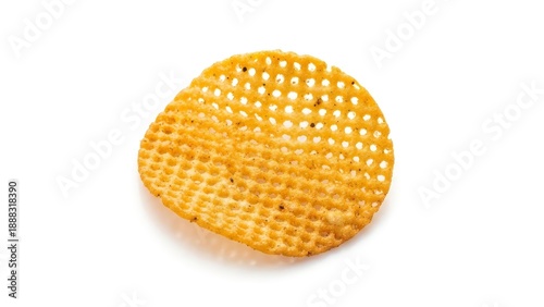 Golden crispy potato chip with intricate lattice pattern on white background perfect for snack or culinary concept