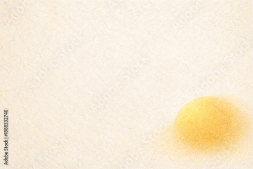 Japanese washi paper texture background with gold ink wash accent