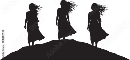 Silhouettes of three women standing on a hilltop together
