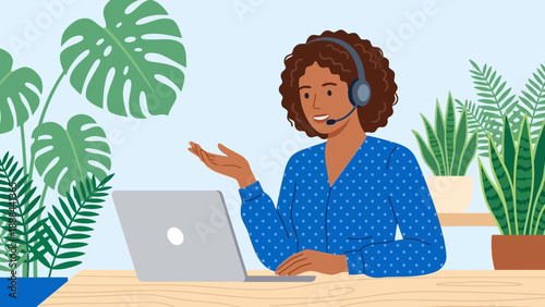 Customer Service Representative Using Laptop and Headset in a Bright Office