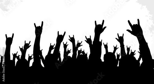 Silhouette of a Cheerful Crowd with Rock On Hand Gestures at a Concert Event