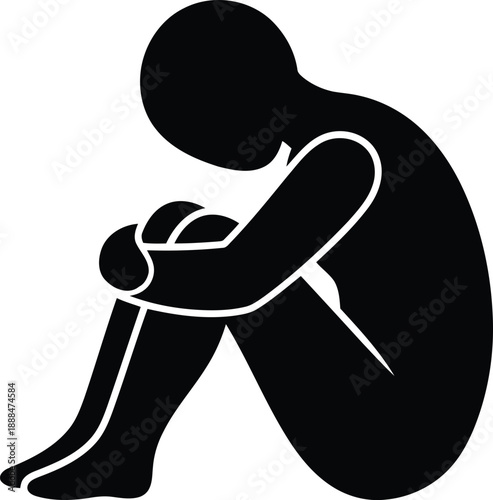 Black silhouette of a person curled up in a fetal position