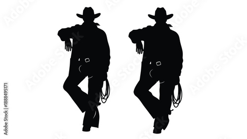 Two cowboys posing with hands on hips a striking silhouette